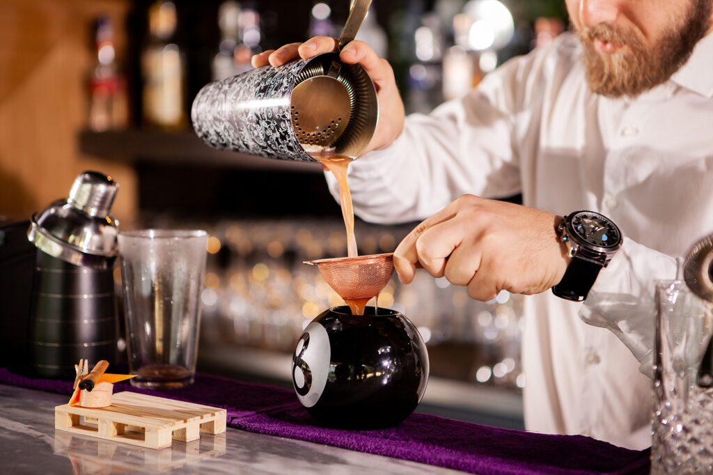 bartender-bartender-is-pouring-a-drink.jpg